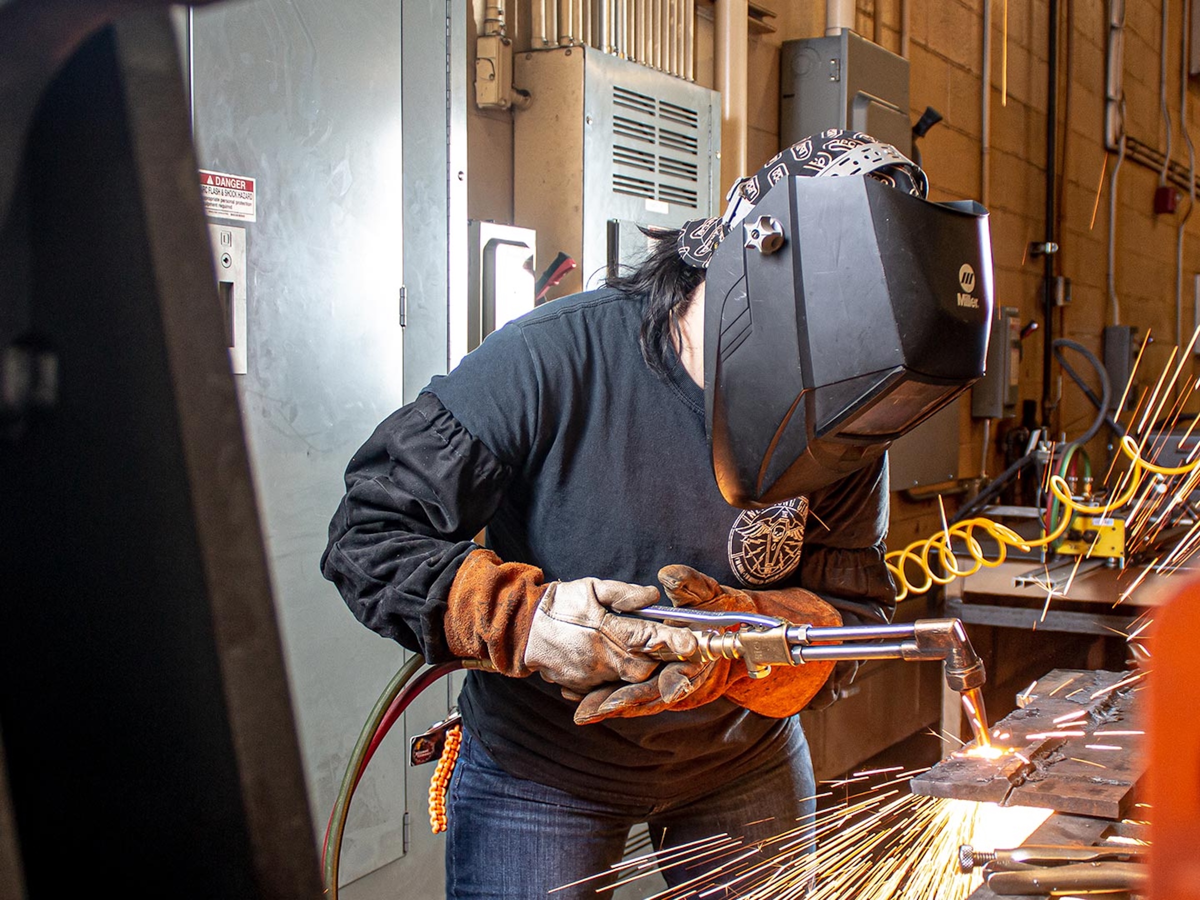 Image of person welding.