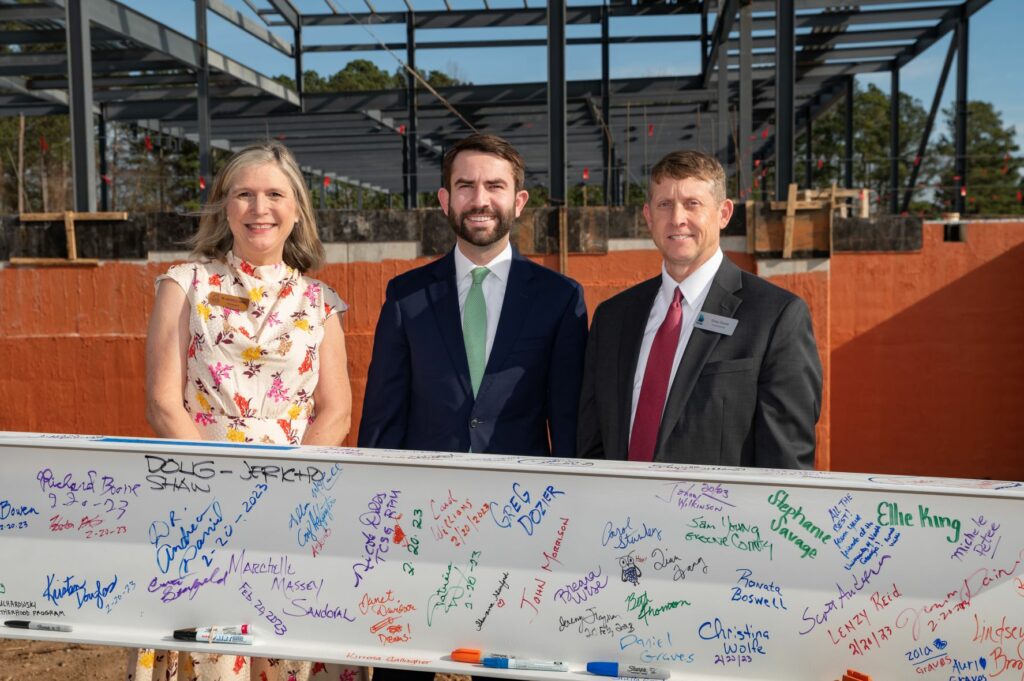 Athens Technical College President Andrea Daniel, Rep. Houston Gaines and Technical College System of Georgia Commissioner Greg Dozier (pictured left to right) spoke at the College's Topping Out Ceremony for the industrial systems technology building on Monday, Feb. 20, 2023.
